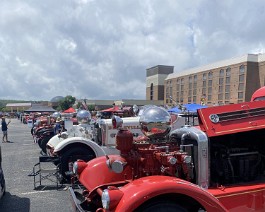 2023 Society for the Preservation and Appreciation of Antique Motor Fire Apparatus in America row A row of Ahrens Fox trucks.