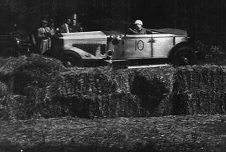 The Cade car is seen sporting a
    competition number at Watkins Glen.