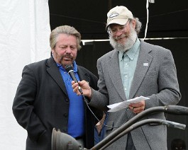 DSC_8096 Dick Shappy receiving "People's Choice" award from Mark Hurwitz for 1919 Indian twin with WW-I machine gun. May 23, 2011 Concours d'Elegance at Fort Adams,...