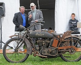 DSC_8097 (1) Dick Shappy receiving "People's Choice" award from Mark Hurwitz for 1919 Indian twin with WW-I machine gun. May 23, 2011 Concours d'Elegance at Fort Adams,...