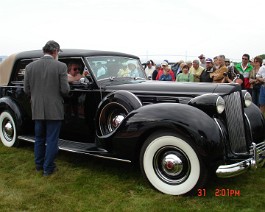 DSC05781 Dick Shappy in the 1938 Packard Landaulet By Rollston accepting the "Best Prewar Open Car" award, Concours d'Elegance, Newport, Rhode Island May 31, 2009.