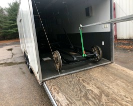 1917 Curtiss OXX-6 Aero Engine Race Car 2019-11-24 IMG_0441 The newly painted chassis is being loaded into the trailer to be returned to our shop.