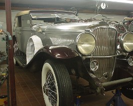 1934 Duesenberg Model J-505 Convertible Sedan Body by Derham DSC00365 Newly chromed wire wheels and tires. (right side)