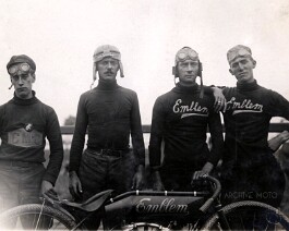 The Emblem factory racing team poses behind one of the factory twin racers at the FAM Championship races held at the Fort Erie dirt track July 14th and 15th, 1911. From left to right: Unidentified, Maurice E. Gale, Lee S. Taylor, and Frank L. Valiant. Team Captain Taylor placed 2nd in the 10-mile stripped stock twin class event and a few 3rd place finishes were split between Taylor and Valiant that day.